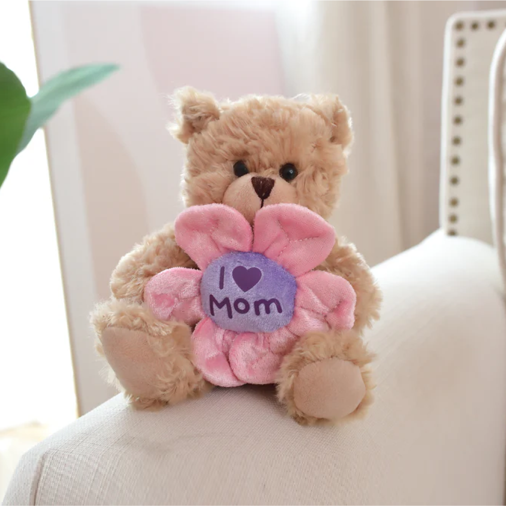 6" Sitting Sofa Mocha Bear Holding Flower, Featuring Soft and a Sweet Floral Detail by Plushland.