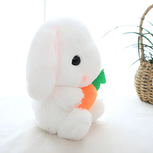 Sitting Right Side Easter Rabbit Holding Carrot, Featuring Soft Fur and a Cute Expression by Plushland.






