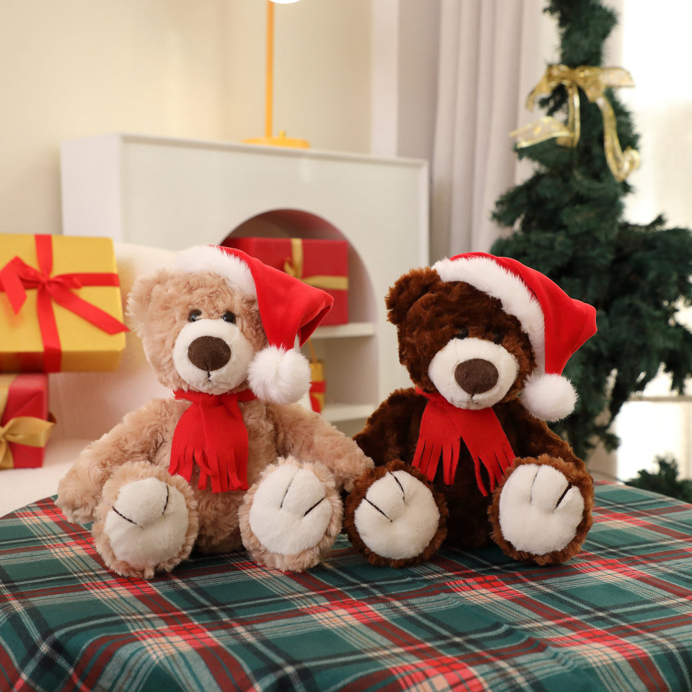 12" Sitting Beige & Chocolate Teddy Bear Named Logan, Wearing Festive Holiday-Themed Accessories Such As a Red Scarf and Santa Hat by Plushland/