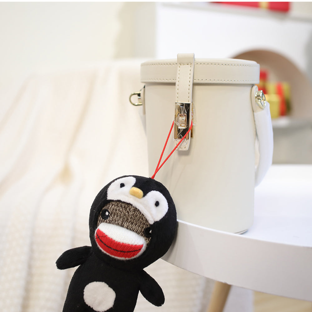 4" Sockiez Penguin Ornament Plush Toy, Featuring a Festive Design with Soft Fabric and a Hanging Purse by Plushland.