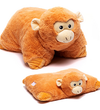 Plush monkey toy with a pillow on a white background