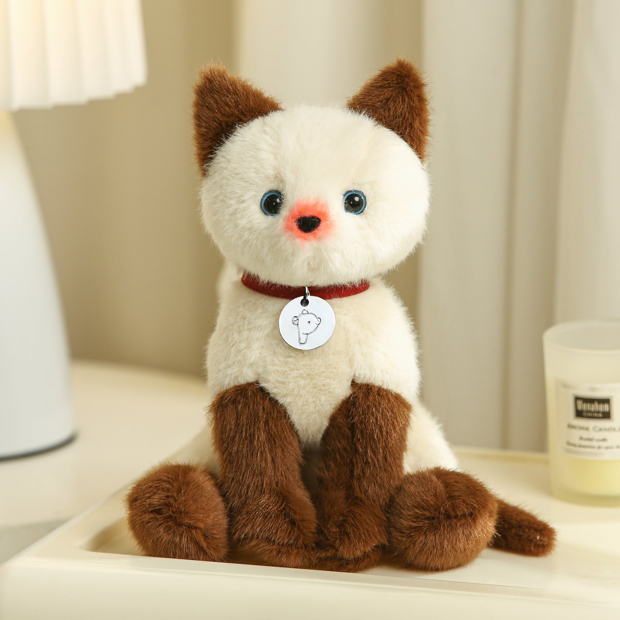 8" Mochi the Siamese Kitty with Collar, Featuring Soft Fur and Sitting on a Cute Base by Plushland.