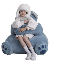 Child relaxing in the Weighted Koala Bean Bag Chair for sensory comfort
