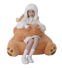 Child relaxing in the Weighted Monkey Bean Bag Chair for everyday comfort