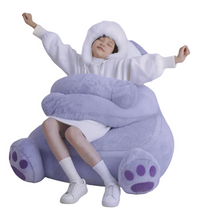 Child relaxing in the Weighted Panda Bean Bag Chair designed for everyday comfort