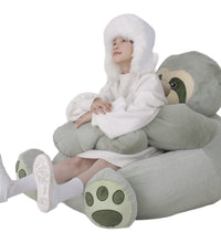 Child sitting comfortably in the Weighted Sloth Bean Bag Chair