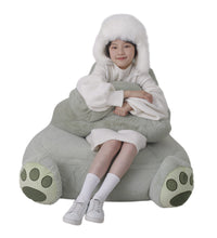 Child enjoying the Weighted Sloth Bean Bag Chair for relaxation