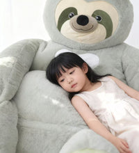 Child cuddling the Weighted Sloth Bean Bag Chair for sensory comfort