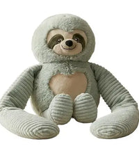 Weighted small sloth hugger toy sitting upright facing front on a white background